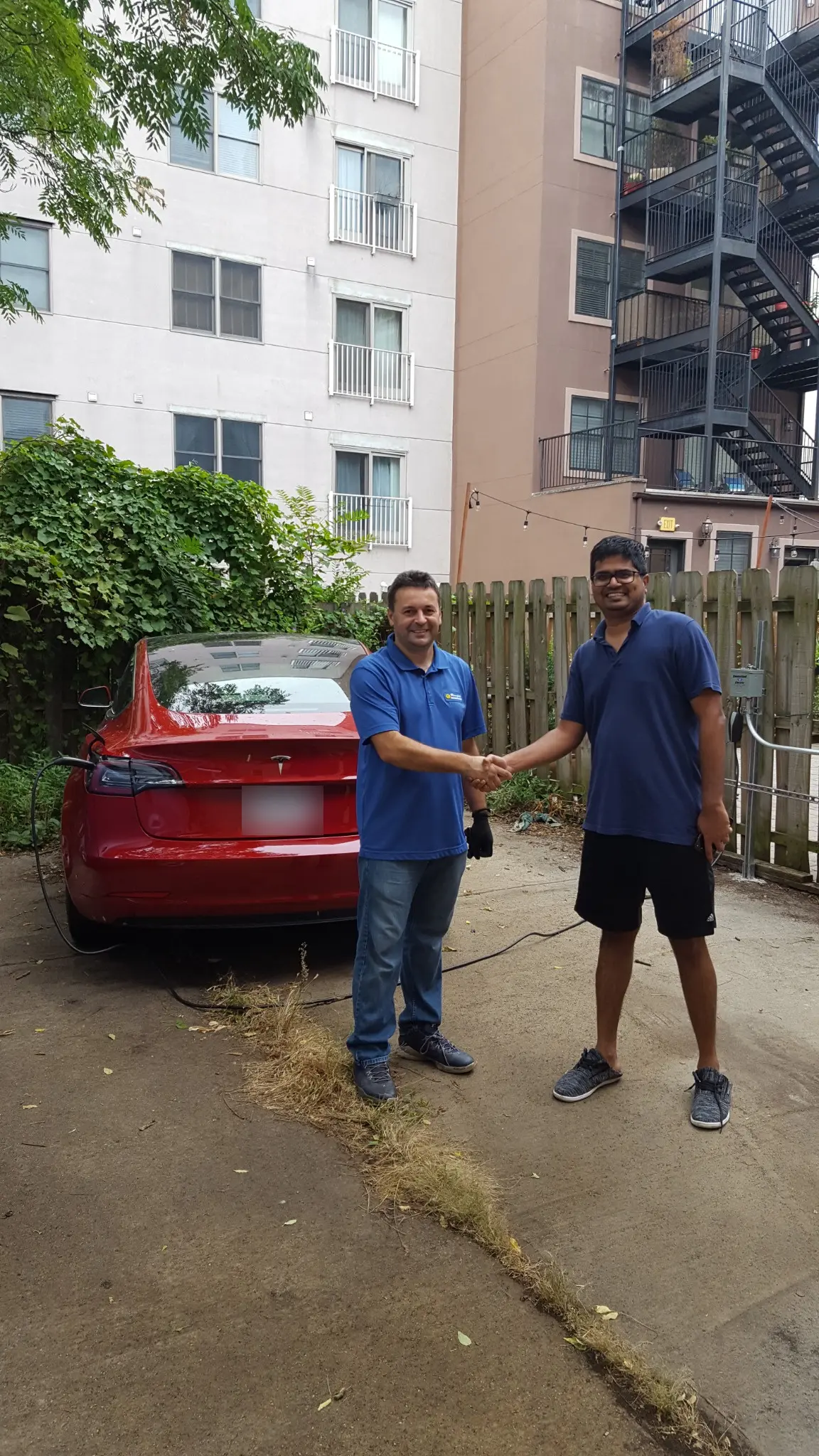 Art Power team member greeting a customer after a completed EV charger installation