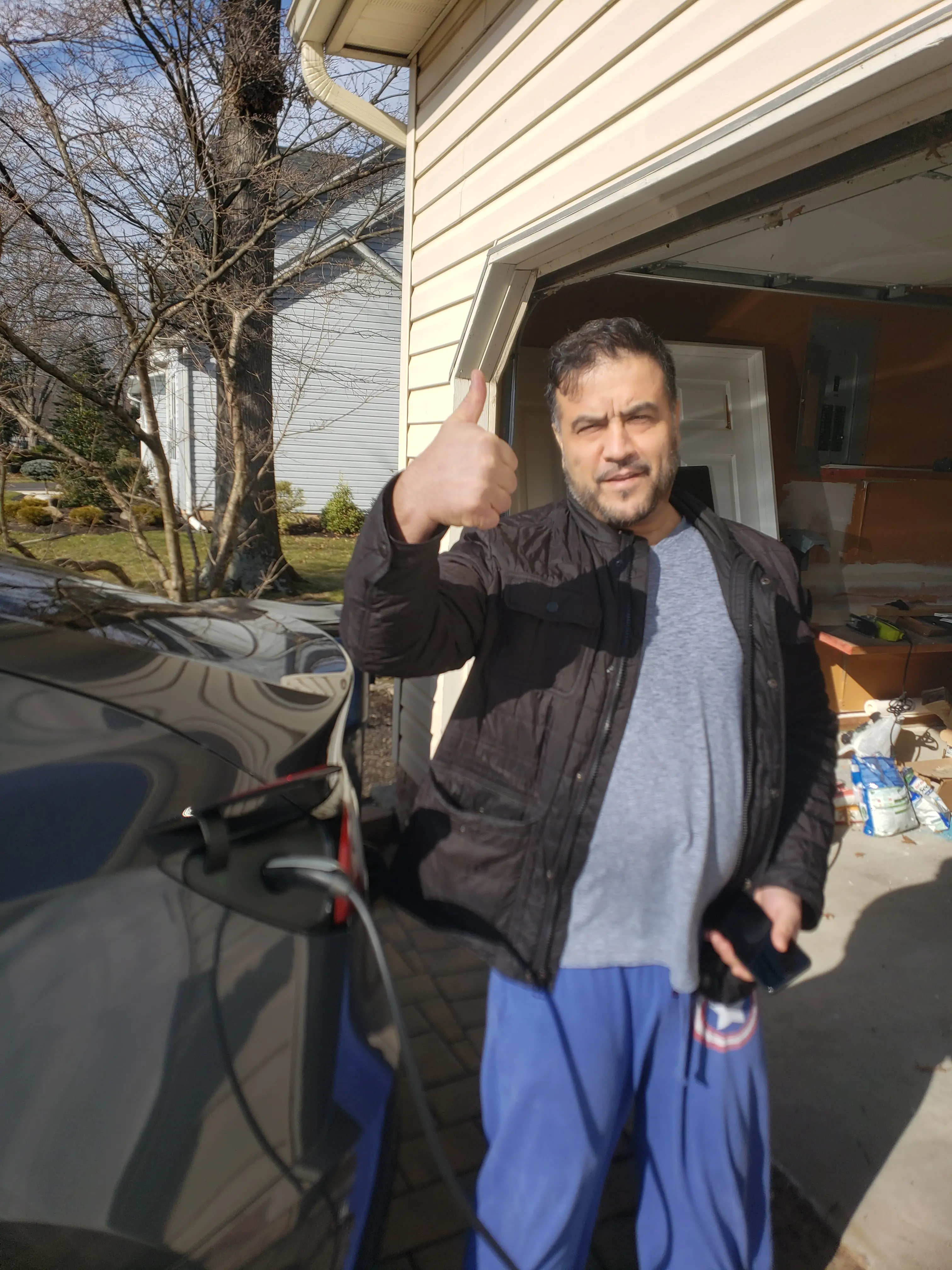 Customer following completion of a home EV charger installation